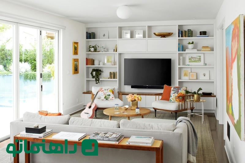 ترندهای دکوراسیون ۲۰۲۵؛ دیوار پشت تلویزیون را خاصتر کنید! دیوار+پشت+تلویزیون+کتابخانه+ای